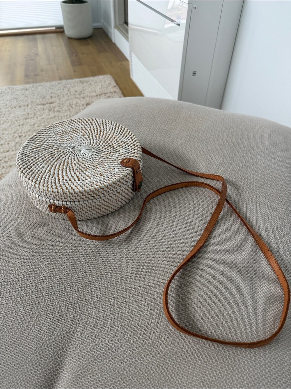 Round Woven Crossbody Bag in Cream with Tan Strap